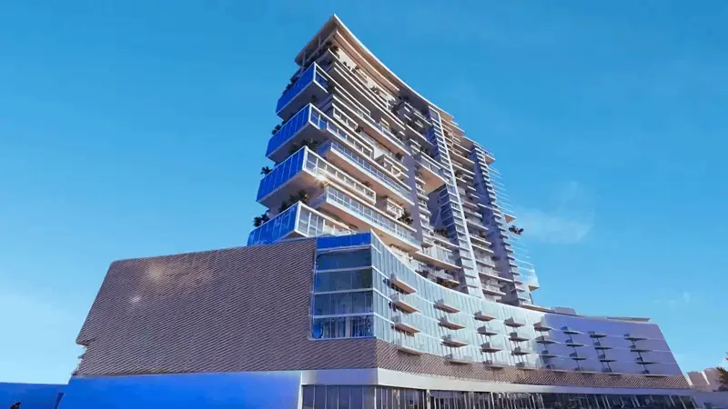Waterfront perspective of Radiant Marina Towers highlighting modern architecture and floor-to-ceiling glass design.png