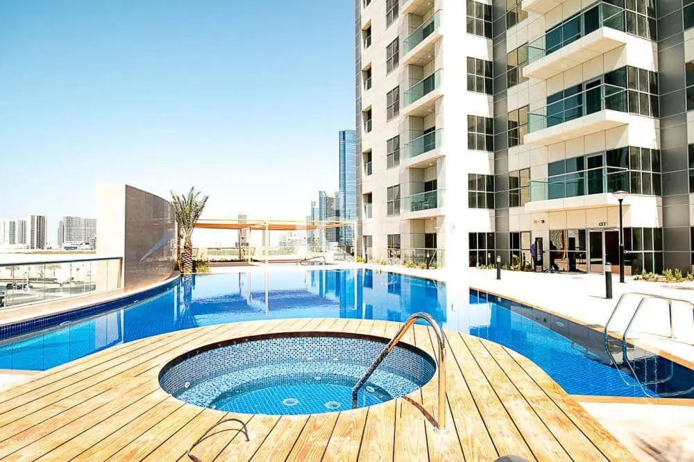 Resort style temperature controlled outdoor swimming pool at Marina Rise Tower in Al Reem Island Abu Dhabi.