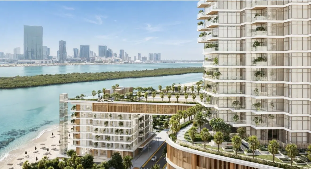 Aerial exterior of Bab Al Qasr Beach Resort Residence 77 Reem Island Abu Dhabi with waterfront podium and planted terraces