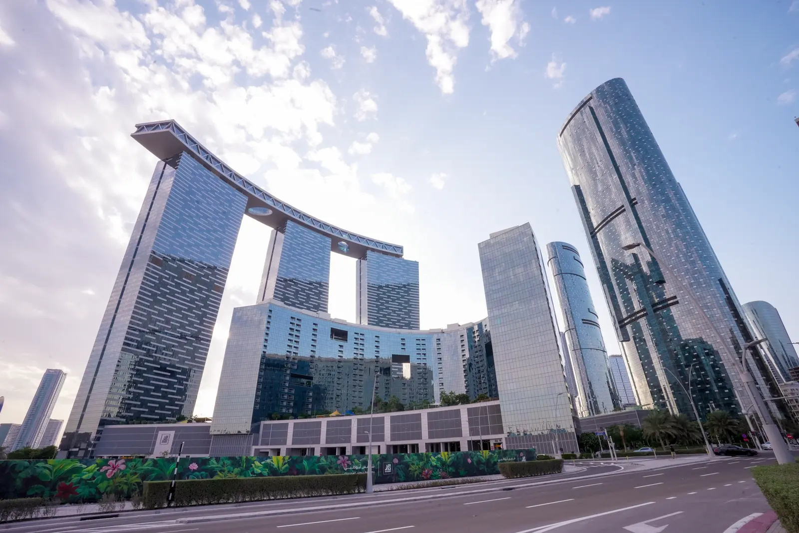 External shot showing the skybridge connection from The Arc Tower to Shams BOUTIK Mall in Abu Dhabi.