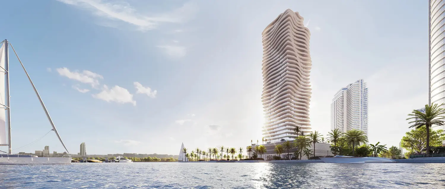 Spacious glass balconies of Elie Saab Waterfront Al Reem Island offering panoramic sea views and premium architectural style.