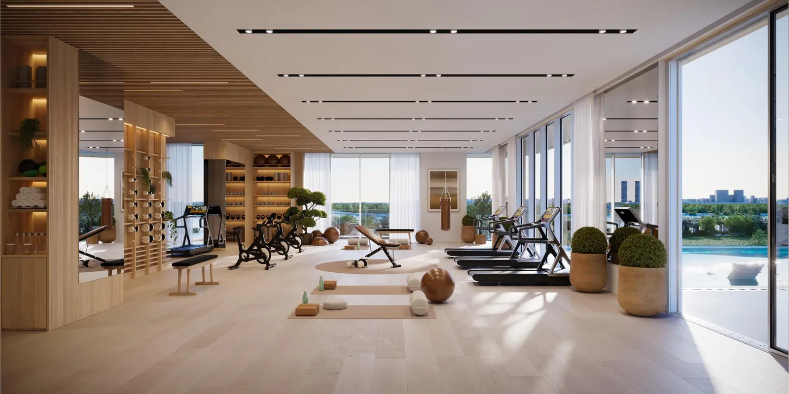 Fully equipped gym in Muheira residential towers on Reem Island, Abu Dhabi, offering fitness facilities with waterfront views..jpg