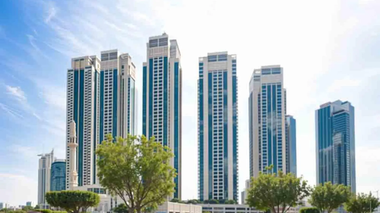 Contemporary exterior of Marina Heights at Marina Square, Al Reem Island, Abu Dhabi, featuring premium waterfront apartment towers and landscaping.