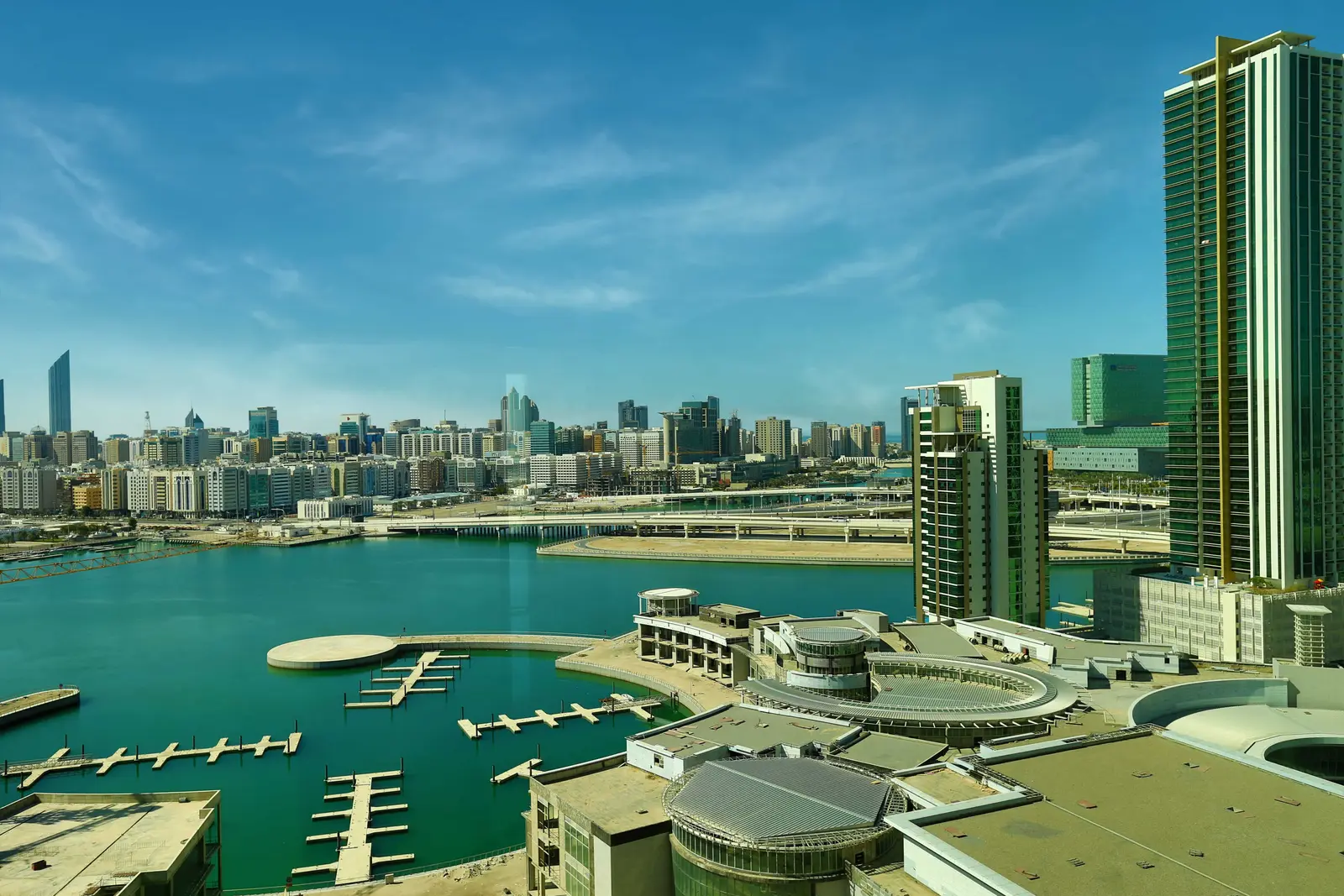 Panoramic exterior of Burooj Views Marina Square, Al Reem Island, Abu Dhabi highlighting elegant façade, balconies, and waterfront living.