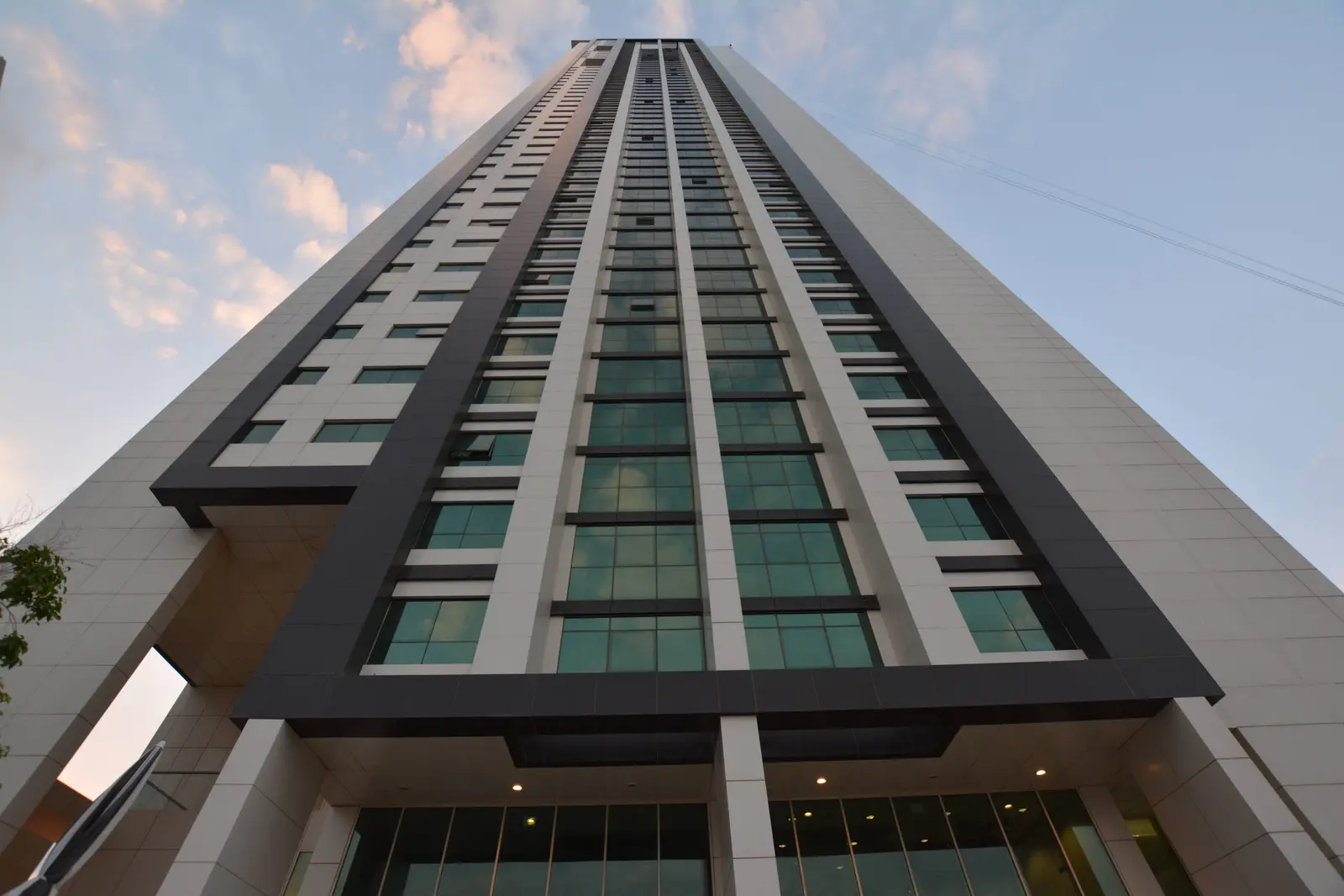 Front façade of Marina Blue Tower in Marina Square, Al Reem Island displaying luxury residential tower and landscaped surroundings.