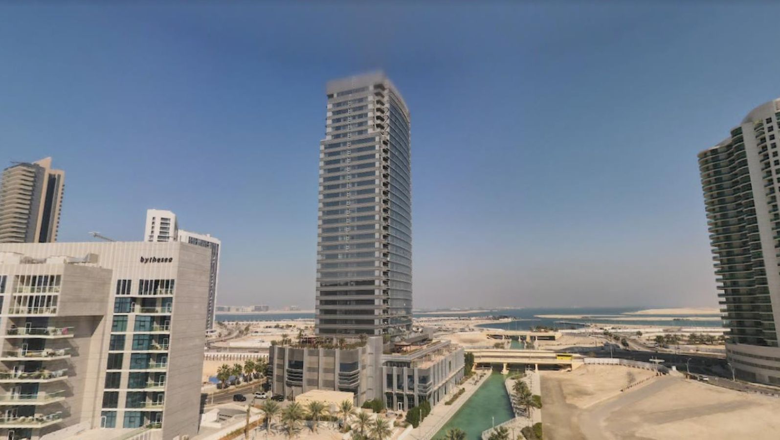 Modern high-rise residential exterior of Al Wifaq Tower located in Shams Abu Dhabi, Al Reem Island, UAE.